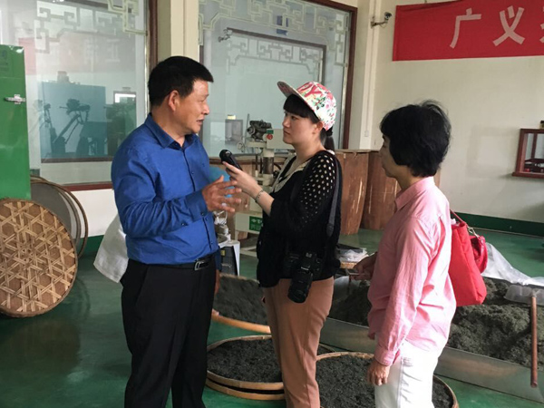 中國國際廣播電臺副總編輯任謙等廣電領(lǐng)導(dǎo)同志考察廣義茶印象園